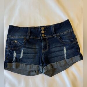 YMI Jean shorts. Boasts a triple button closure and wide waistband. Size 5